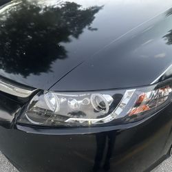 Headlights Drivers Side    Just one  Good Shape 