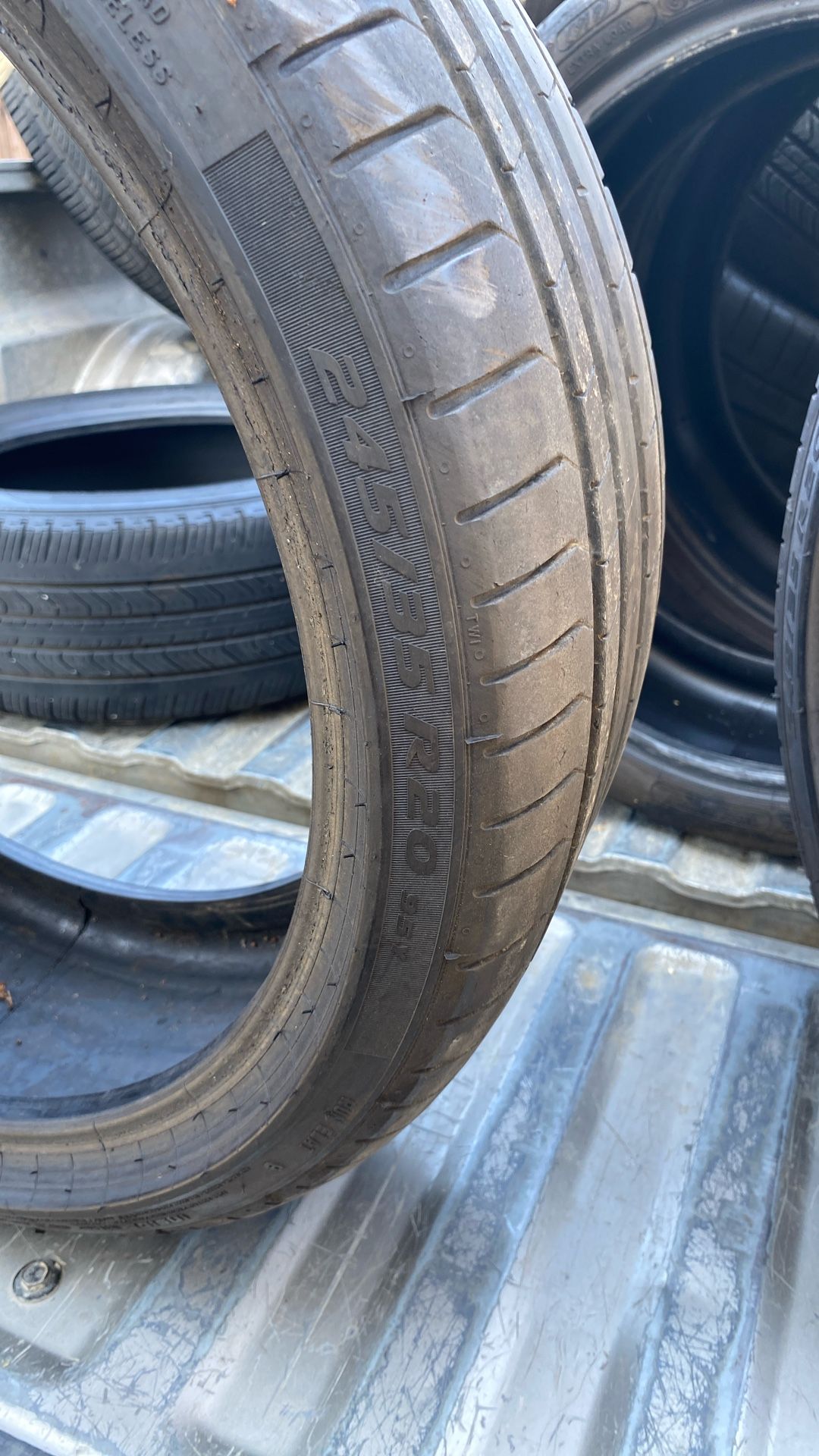 245/35/22 tires in great condition. They have about 60%.