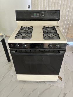 Hot Point Gas Range Stove Works Well!