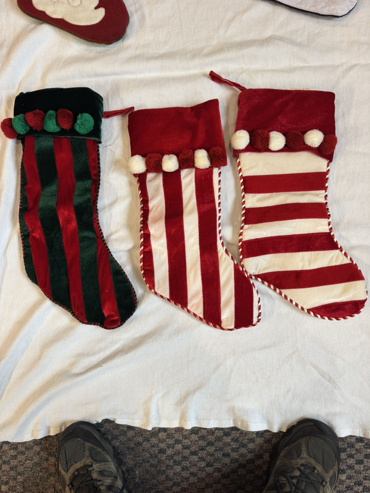 Three Candy Cane Stripped Holiday Stockings