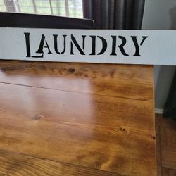 LAUNDRY SIGN IS 5"1/2 TALL BY 30" WIDE 