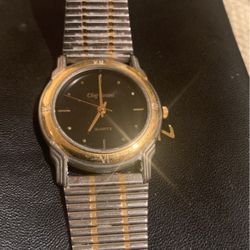 Sleek Cassini Men’s Black And Gold Watch