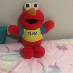Toss And Tickle Me Elmo