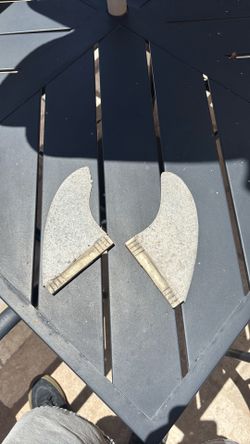 Surfboard fins