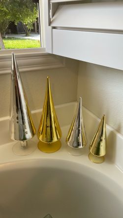 Gold and silver glass cone trees