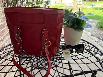 Two authentic hand bags with original tag