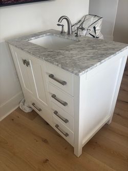White Bathroom Vanity with Marble Top and Sink