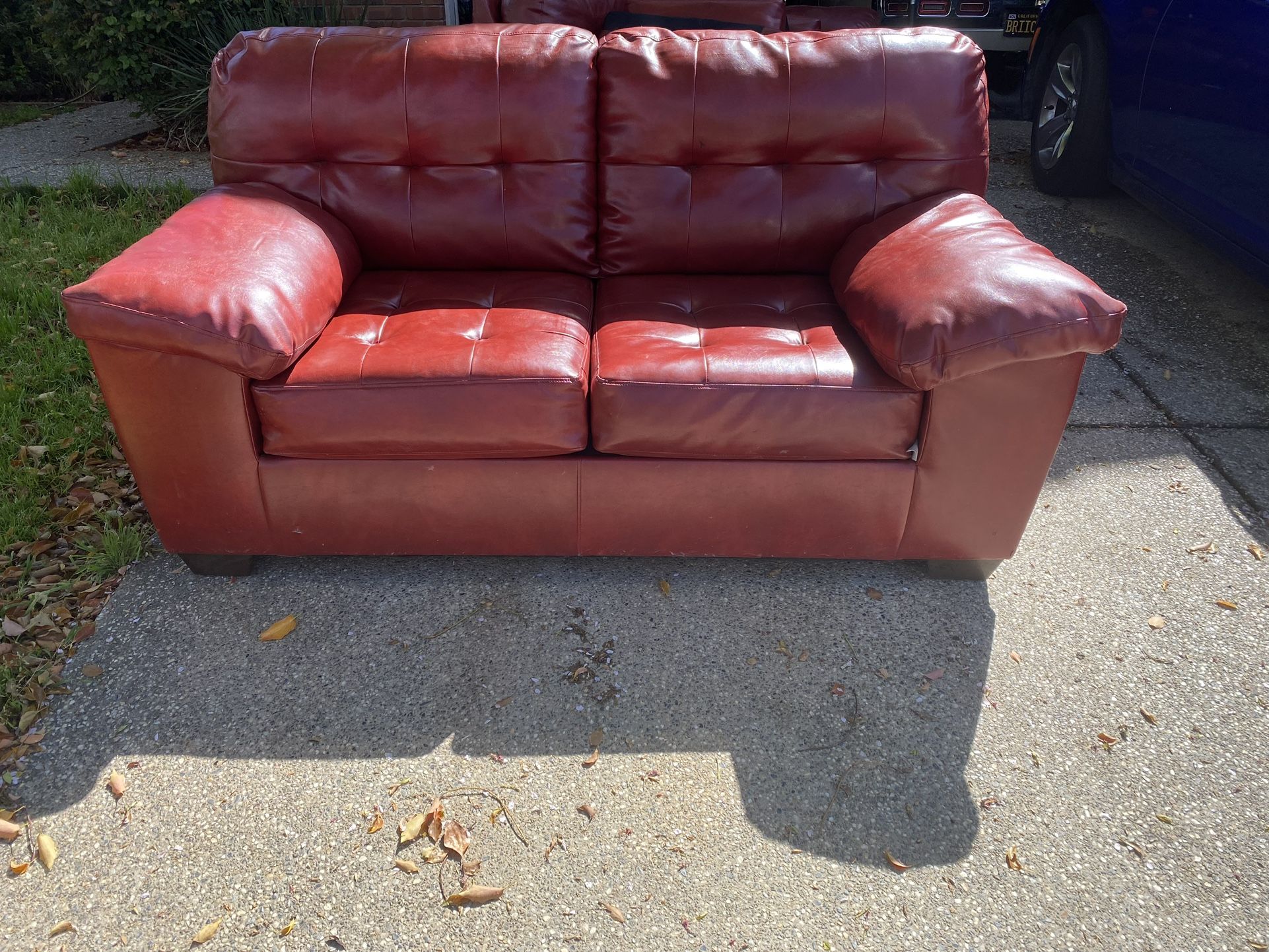 Red loveseat and Couch