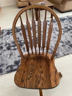 Solid Oak swivel chair with wheels