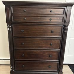 wood dressers (tall and long) with king bedframe