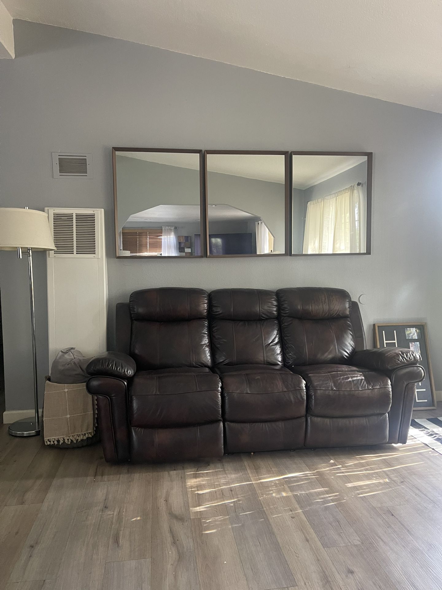 Brown recliner leather Couch 100.00
