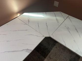 L shape, gold, and white marble desk