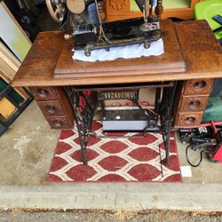 Old Singer Sewing Machine and Cabinet 