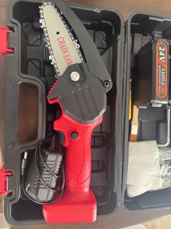 brand new mini chain saw