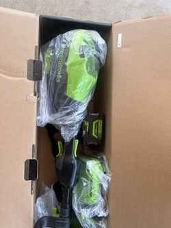 Greenworks Trimmer /w battery And charger. New. 
