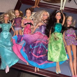Barbies And BRAT dolls with Barbie Clothes And Furniture