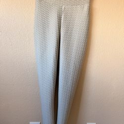 Light grey textured leggings with a stretchy waistband. 