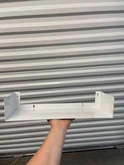 White metal shelves