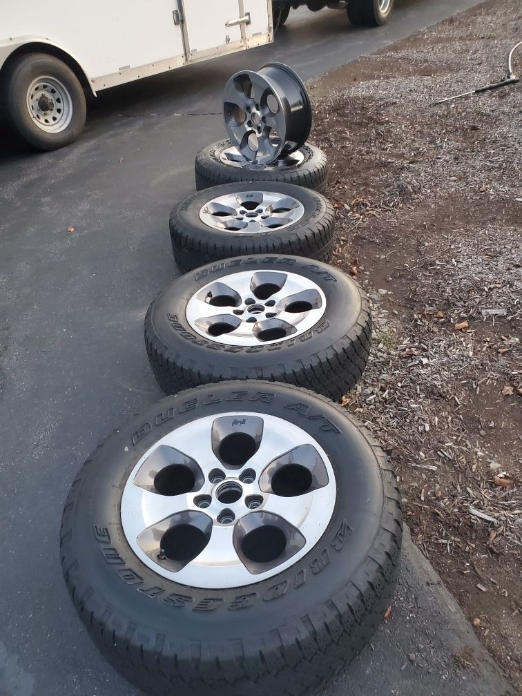 Late model Jeep Wrangler alloy wheels and tires