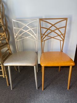 New Modern Accent Stacking Chairs – Gold & Silver, Commercial Quality  Two high-quality commercial-grade metal stacking chairs available. One gold and