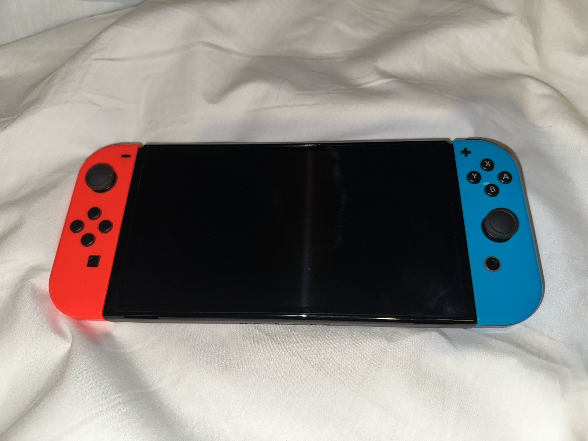 Nintendo Switch Oled - Red & Blue Controller 