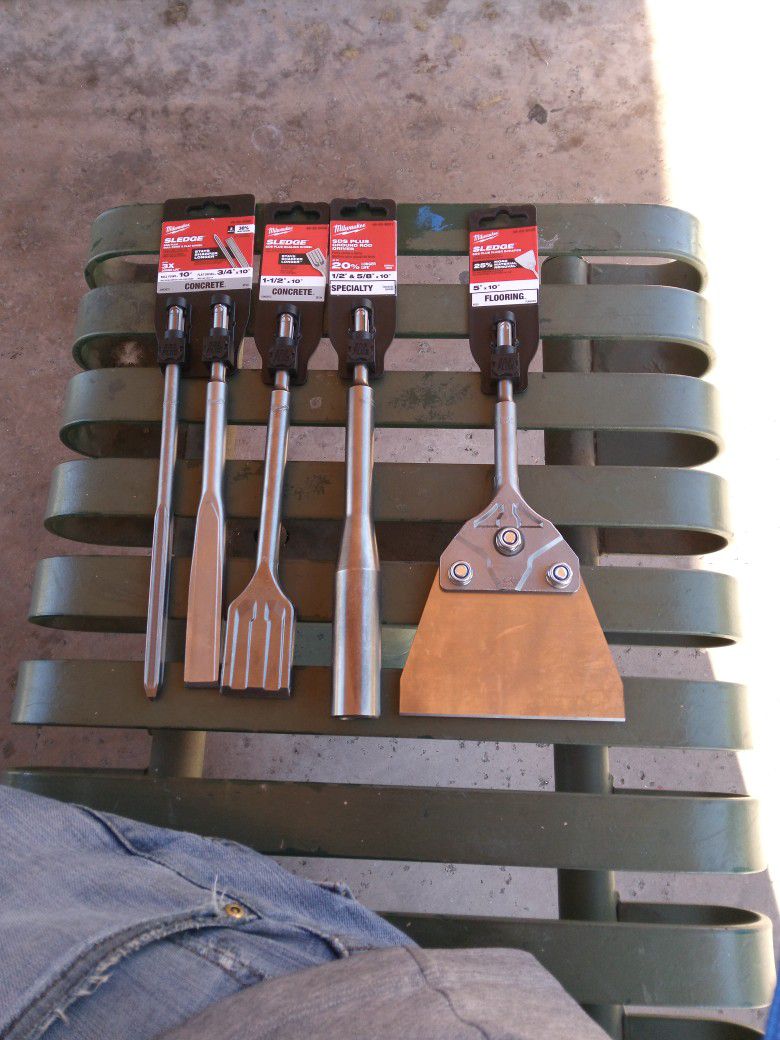 Brand New Milwaukee SDS PLUS Chisels, Ground Rod Driver And Floor Scraper.