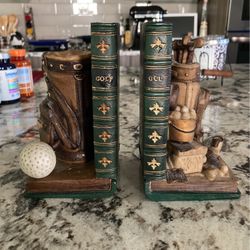 PAIR OF HEAVY GOLF BOOKENDS