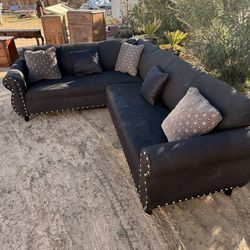 Black Basic Tufted Couch With Permanent Stains 