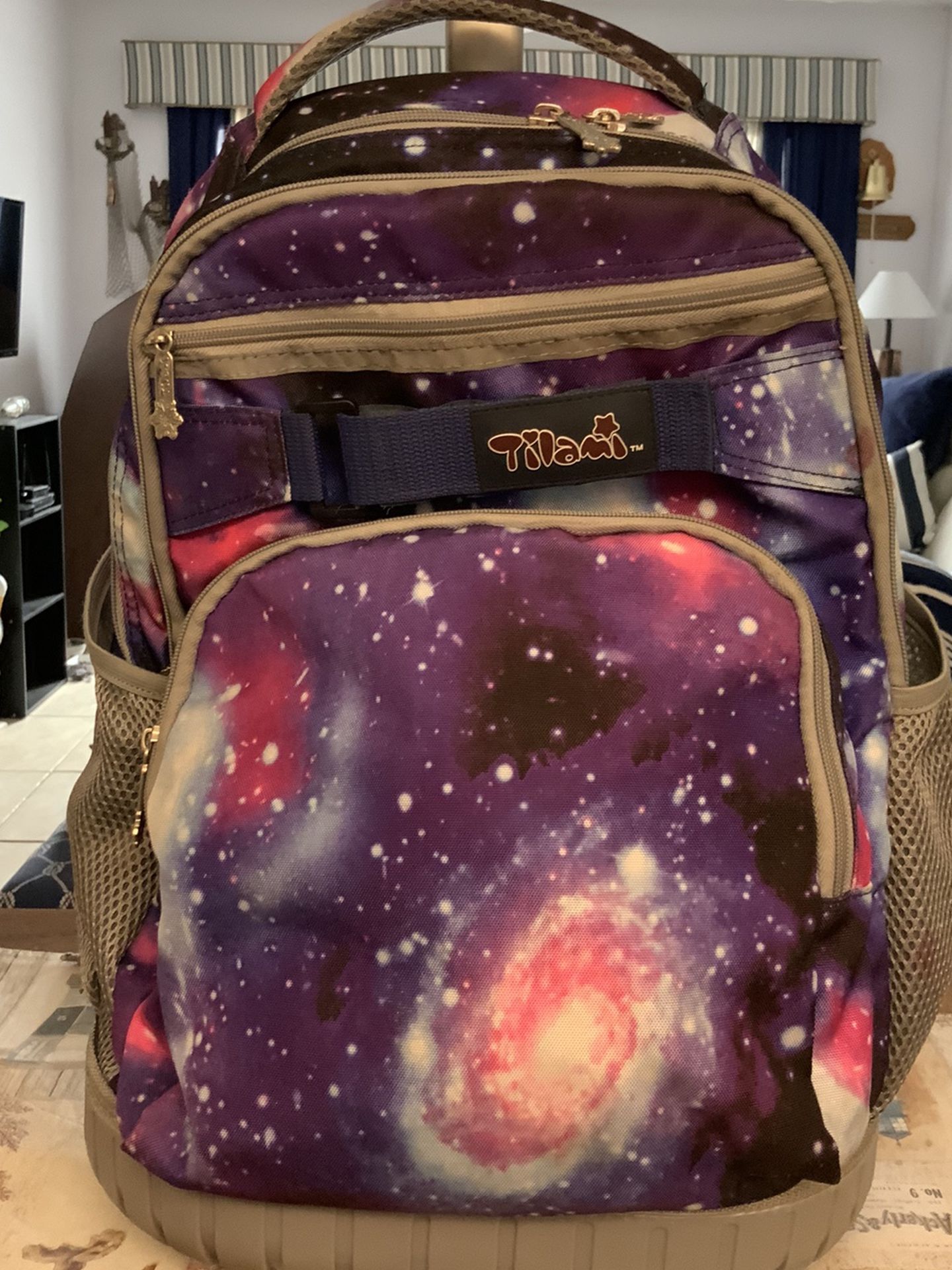 Tilami Rolling Backpack