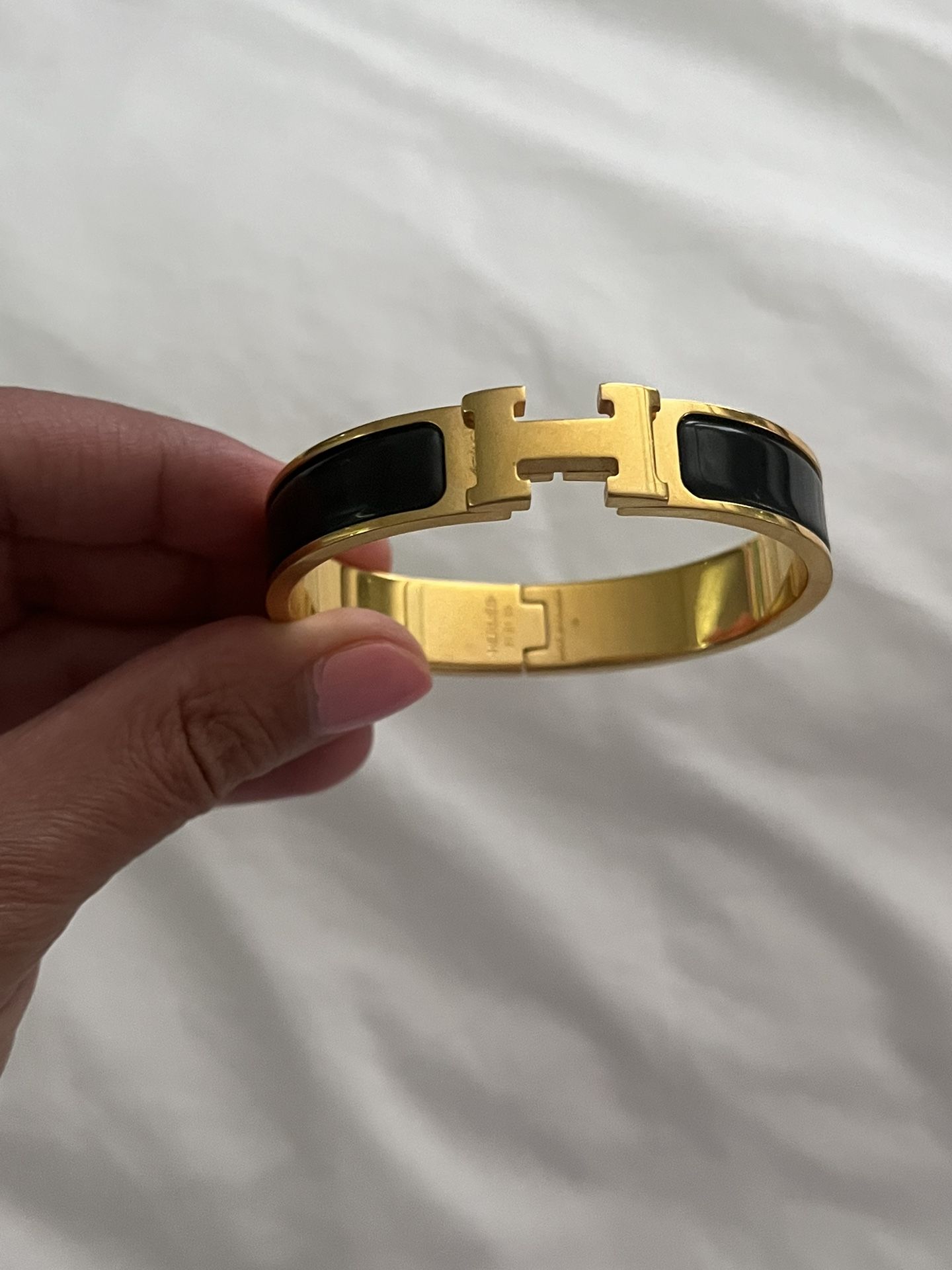 Bracelet Hermès Clic H Noir Et Doré - Modèle à Fermoir - Occasion