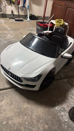 Kids ride on Maserati