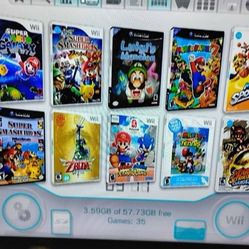 NINTENDO WII + 33 WII and GAMECUBE GAMES
