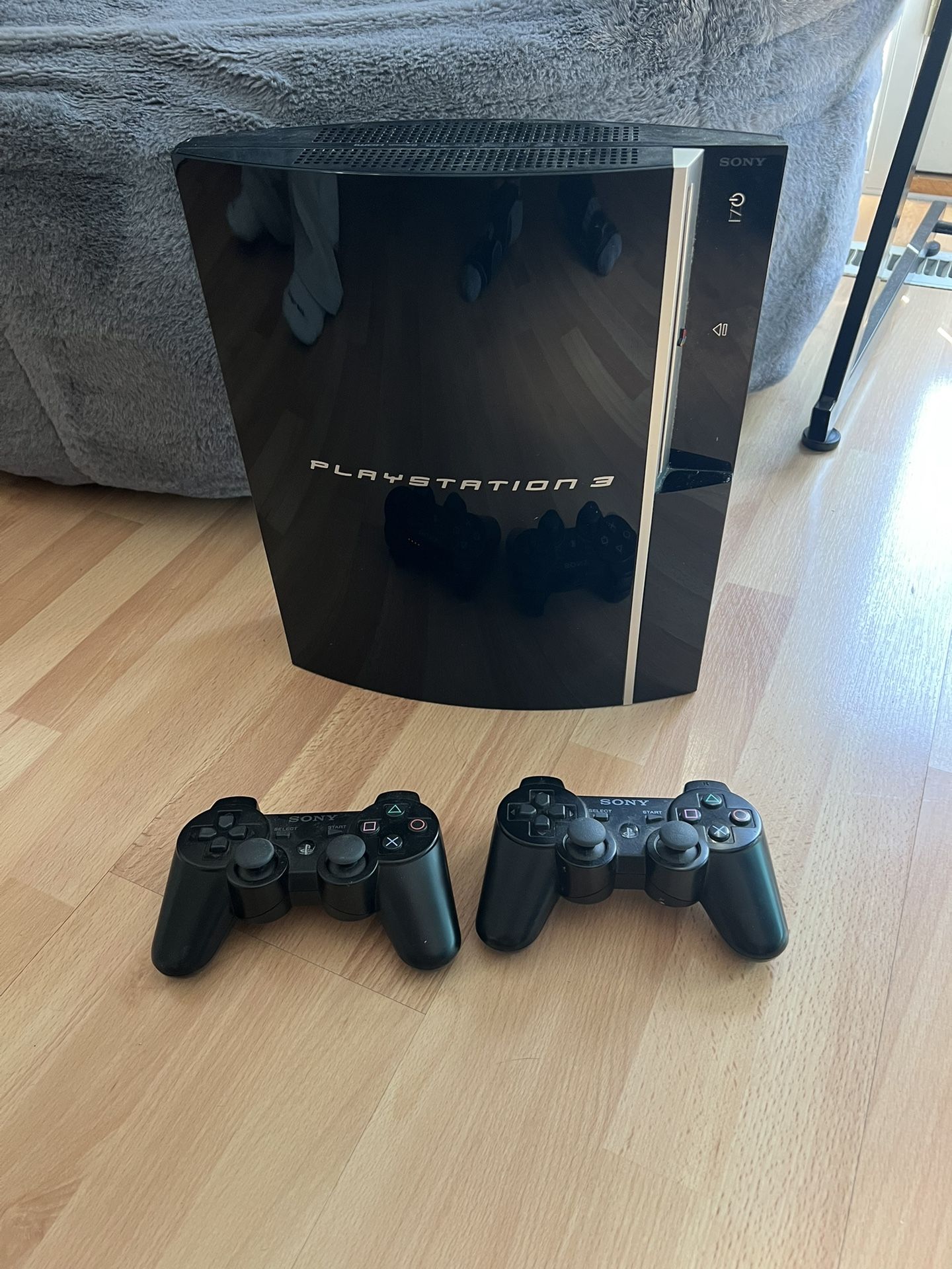 PlayStation 3 with Controllers + Portal 2