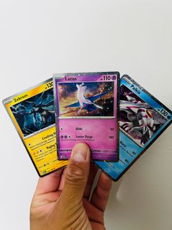 ENHANCED 2-PACK BLISTER PACK COSMOS HOLO PROMO CARD SET (LATIOS, ZEKROM, PALKIA)