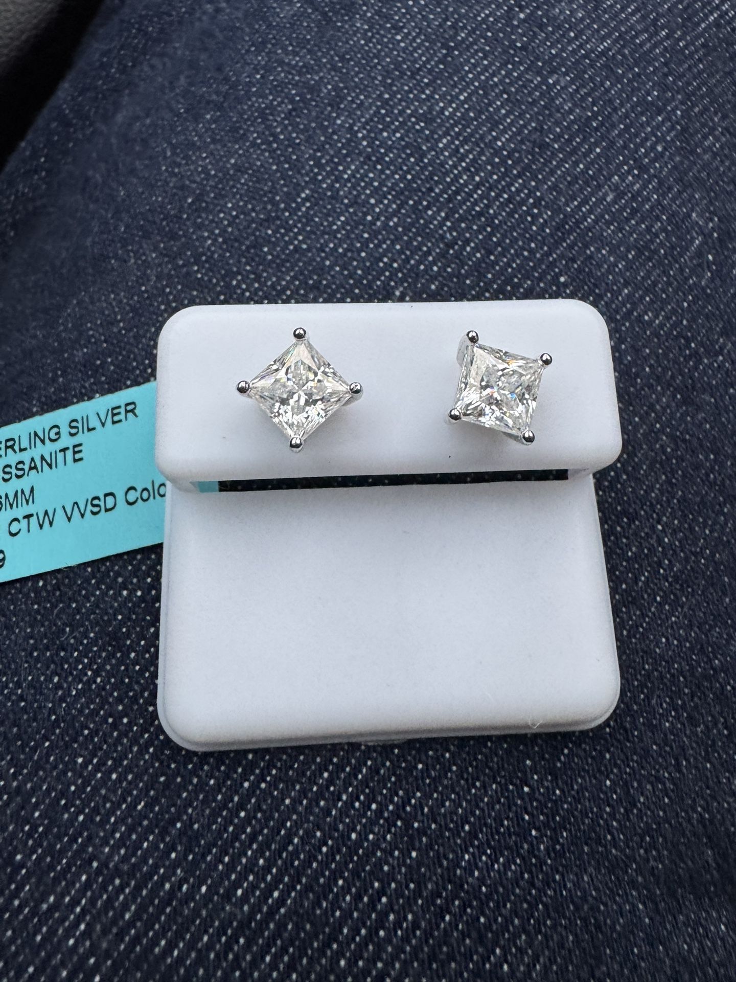 Stunning square-cut moissanite earrings set in sterling silver. ✨