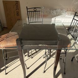 Bistro Table With Leather Covered Chairs