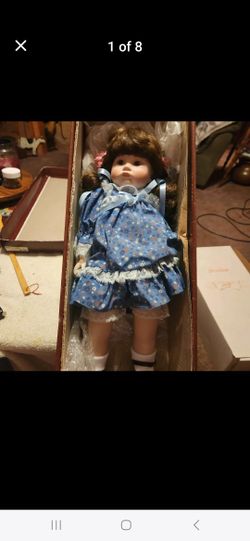 REDUCED TO $20.00

Collectible porcelain doll...she comes with her box...approximately  18" tall...she originally cost $69.00...buy her for $30.00

