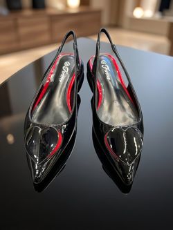 Brand new pointy black/red flat shoes.