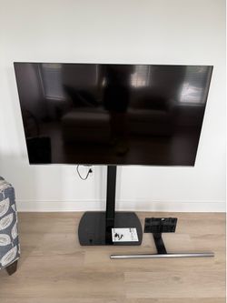 55” Samsung TV with Stand