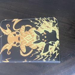 Pokémon binder pikachu and charzard 200 cards 50 pages