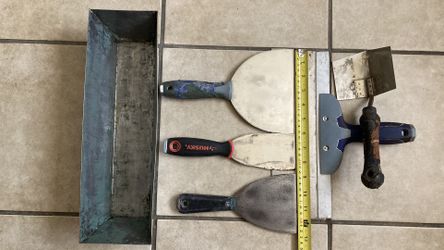 TAPING OR CAULKING TOOLS