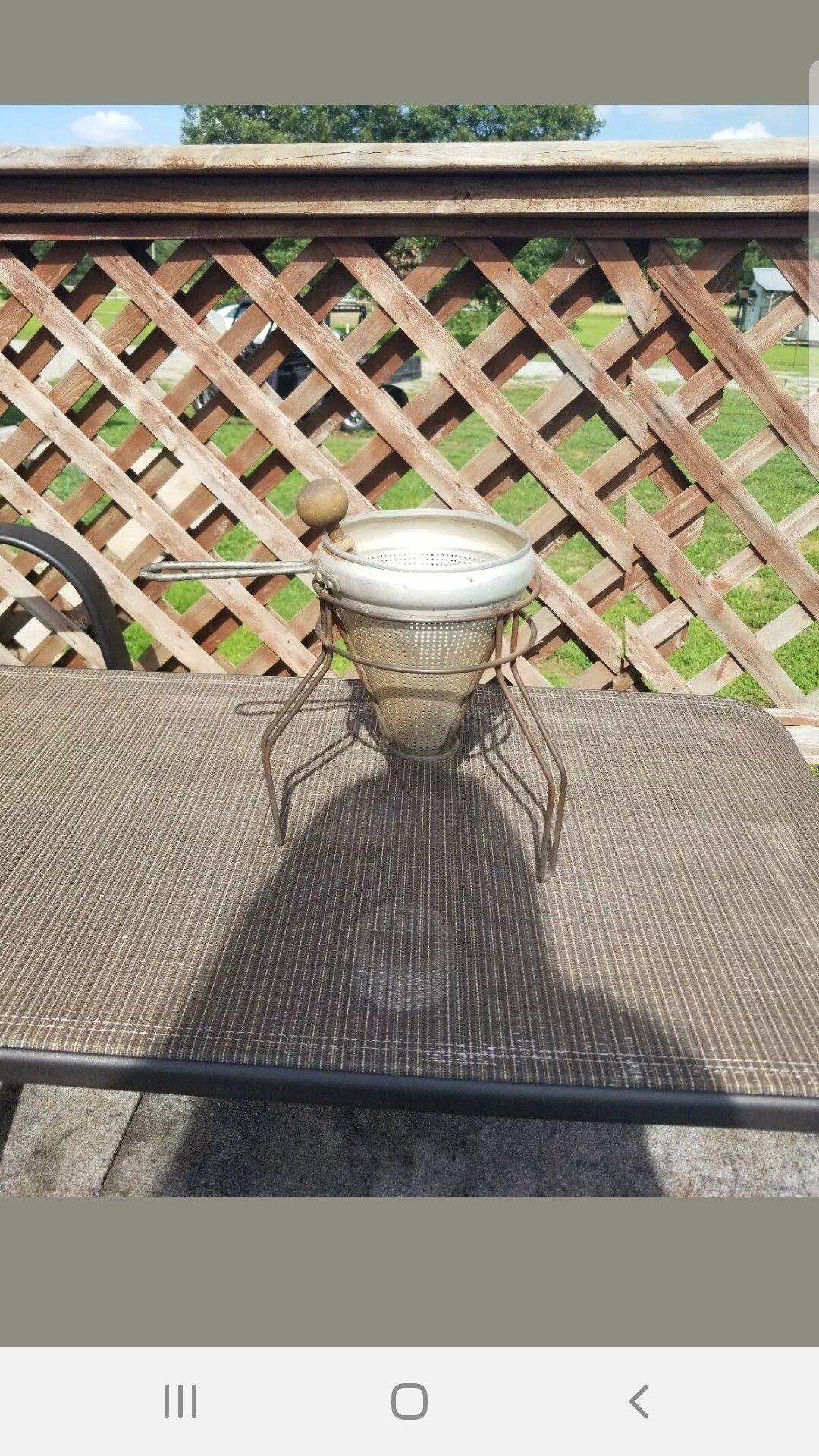 Vintage metal Strainer or Masher with stand and wooden pestle