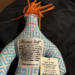 HERE'S A LITTLE DAMMIT DOLL, THAT YOU CAN'T DO WITHOUT, GRASP FIRMLY