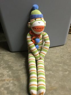 Brand new stripped sock monkey stuffed animal