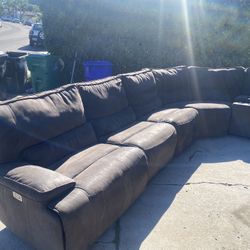 Reclining couches with charging ports