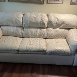 Beautiful leather sofa with queen size pullout mattress
