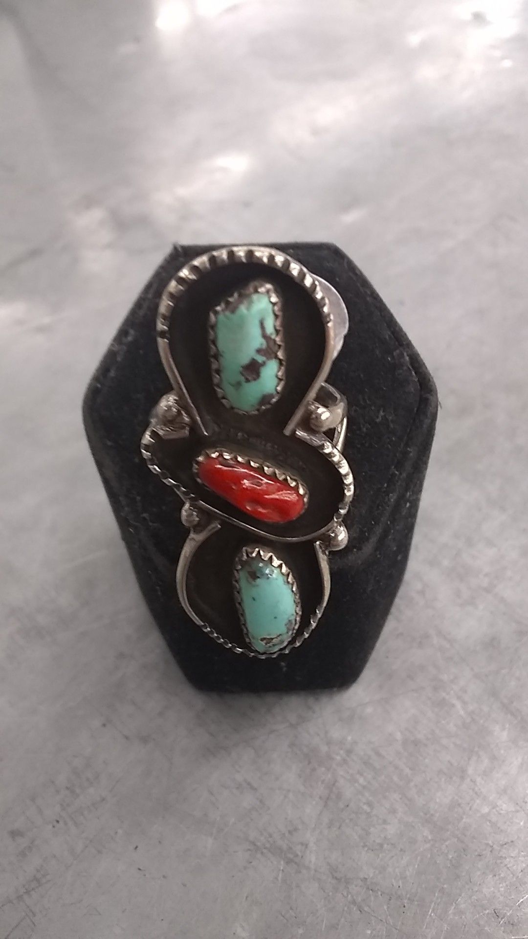 Turquoise and coral in silver ring