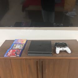 Barely used PS4 Slim 1tb Storage(Everything Included)