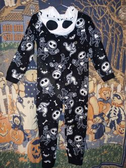 The Nightmare Before Christmas and Beetlejuice Kids Halloween Onesies. One pair of Pumpkin Slippers.