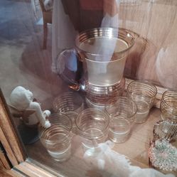 Vintage carafe with eight glasses gold inlay